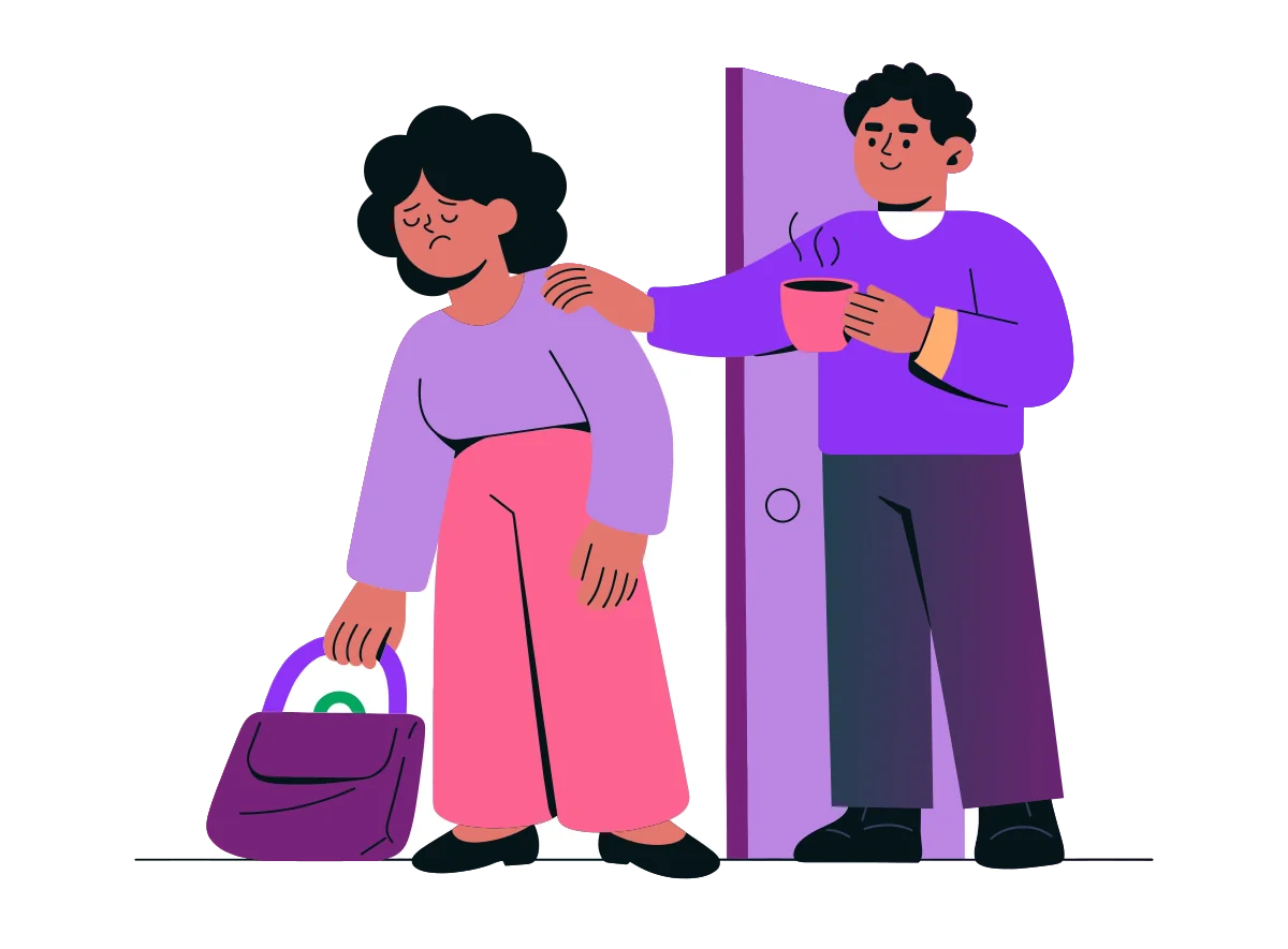 A woman arriving home tired with a bag, while her partner greets her at the door with a mug of tea and a hand on her shoulder